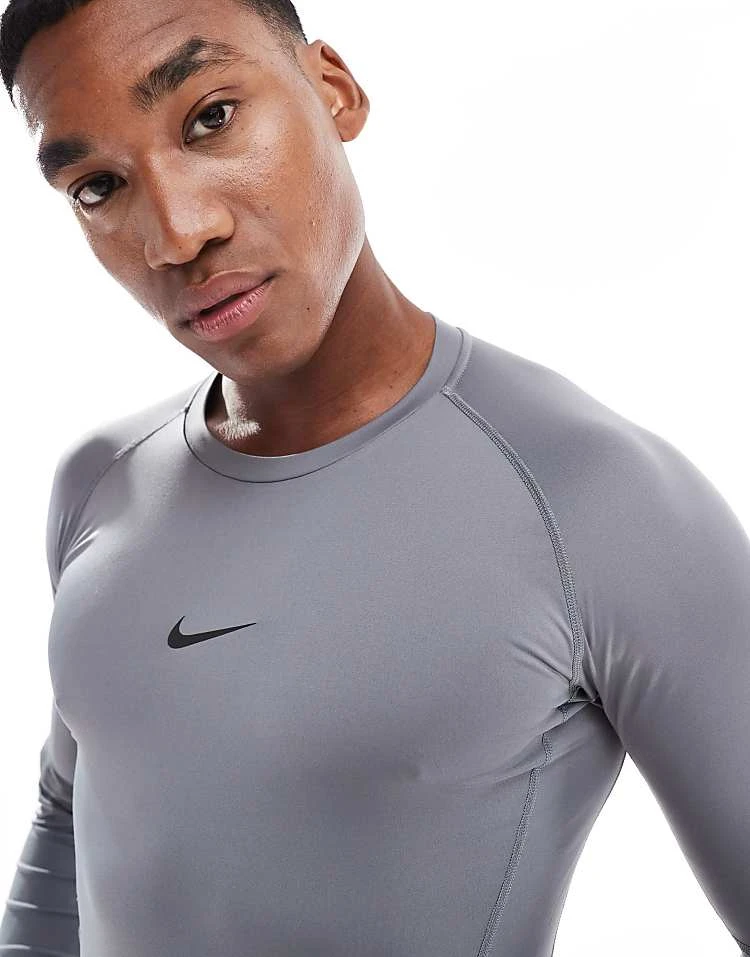 Nike Training Nike Pro Training Dri-FIT Muscle Fit Long Sleeve Top In Dark Grey For Men Charcoal 3 Nike Training Nike Pro Training Dri-FIT Muscle Fit Long Sleeve Top In Dark Grey For Men Charcoal