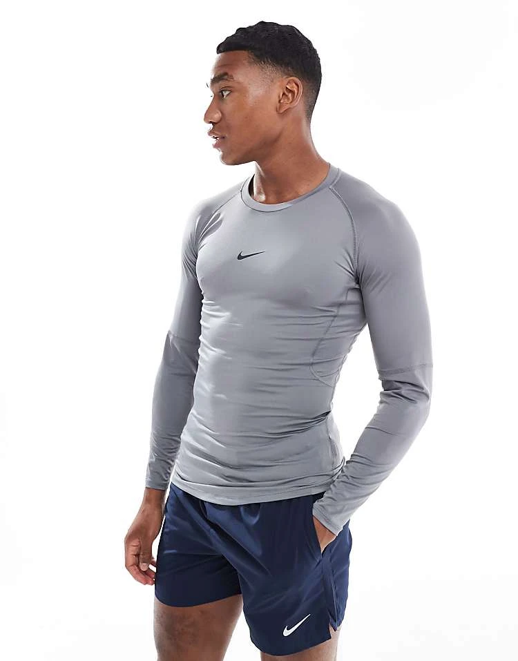 Nike Training Nike Pro Training Dri-FIT Muscle Fit Long Sleeve Top In Dark Grey For Men Charcoal 5 Nike Training Nike Pro Training Dri-FIT Muscle Fit Long Sleeve Top In Dark Grey For Men Charcoal - Image 3
