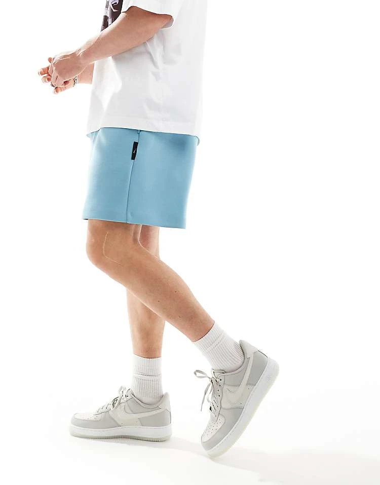 Nike Tech Fleece Reimagined Oversized Shorts In Light Blue For Men Mid Blue 6 Nike Tech Fleece Reimagined Oversized Shorts In Light Blue For Men Mid Blue - Image 4