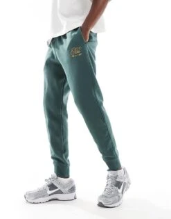 Nike Club Festive Joggers In Dark Green For Men