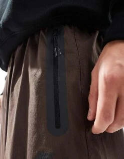 Nike Tech Woven Oversized Fit Trousers In Brown For Men -Nike Sales Store 206615573 3