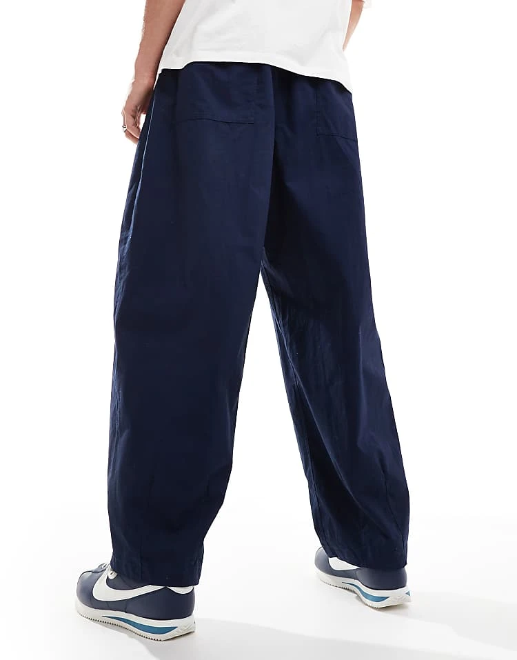 Nike Club Woven Balloon Oversized Trousers In Navy For Men 4 Nike Club Woven Balloon Oversized Trousers In Navy For Men - Image 2
