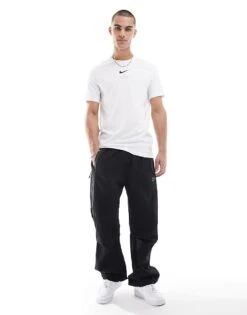 Nike Tech Woven Loose Fit Trousers In Black For Men