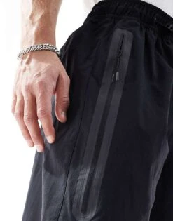 Nike Tech Woven Loose Fit Trousers In Black For Men -Nike Sales Store 206615844 3