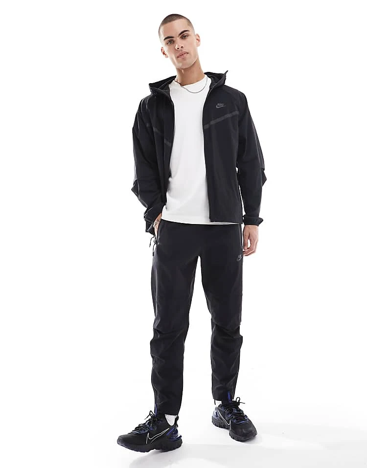 Nike Tech Woven Open Hem Trousers In Black For Men 3 Nike Tech Woven Open Hem Trousers In Black For Men