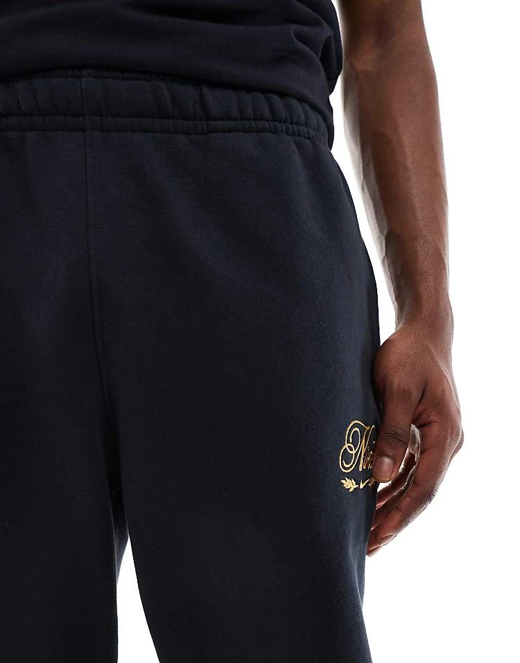 Nike Club Festive Joggers In Black For Men 4 Nike Club Festive Joggers In Black For Men - Image 2