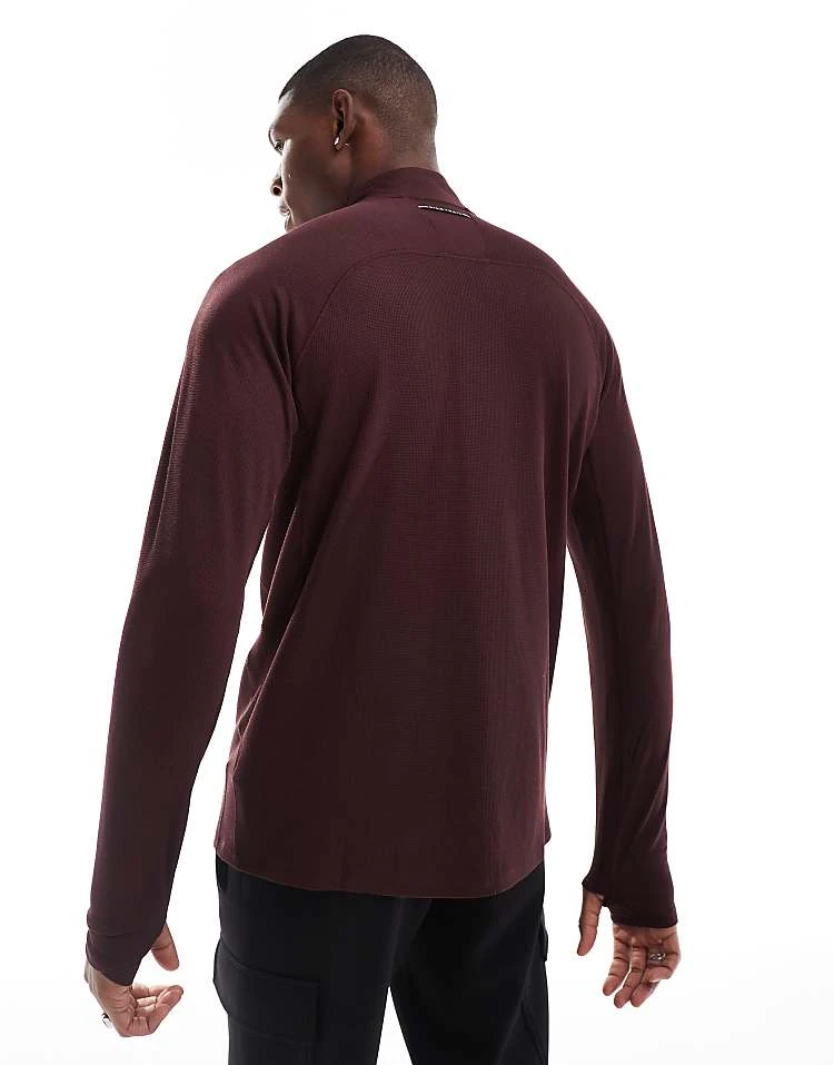 Nike Running Trail 1/4 Zip Sweatshirt In Burgundy For Men 5 Nike Running Trail 1/4 Zip Sweatshirt In Burgundy For Men - Image 3