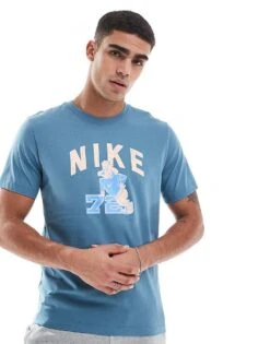 Nike Training College 72 Graphic T-shirt In Blue For Men Mid Blue -Nike Sales Store 207049728 1 midblue 1