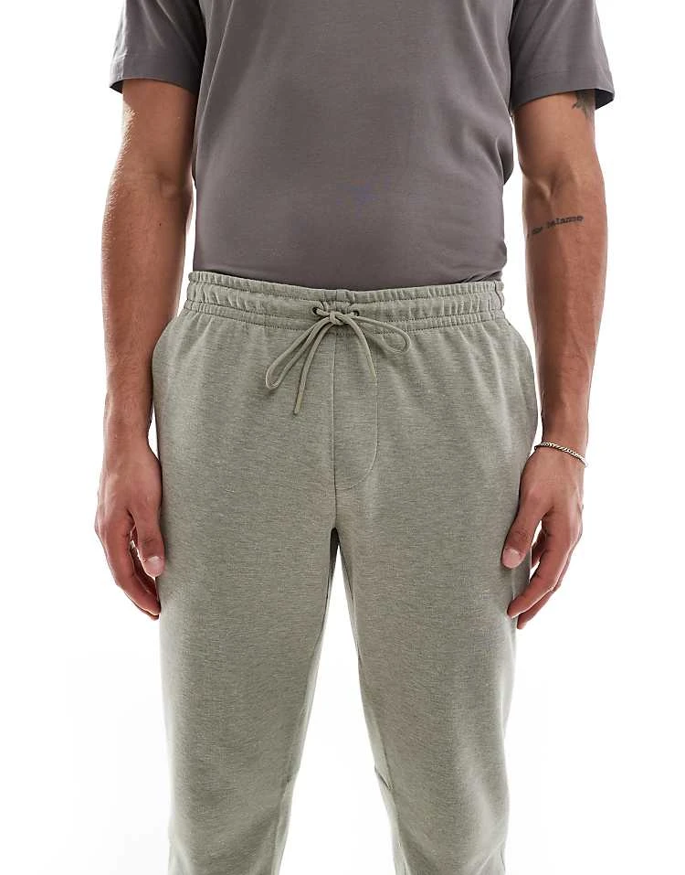 Nike Training Primary Dri-FIT Joggers In Grey For Men Khaki 7 Nike Training Primary Dri-FIT Joggers In Grey For Men Khaki - Image 5