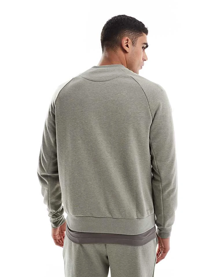 Nike Training Primary Dri-FIT Sweatshirt In Light Khaki For Men 4 Nike Training Primary Dri-FIT Sweatshirt In Light Khaki For Men - Image 2