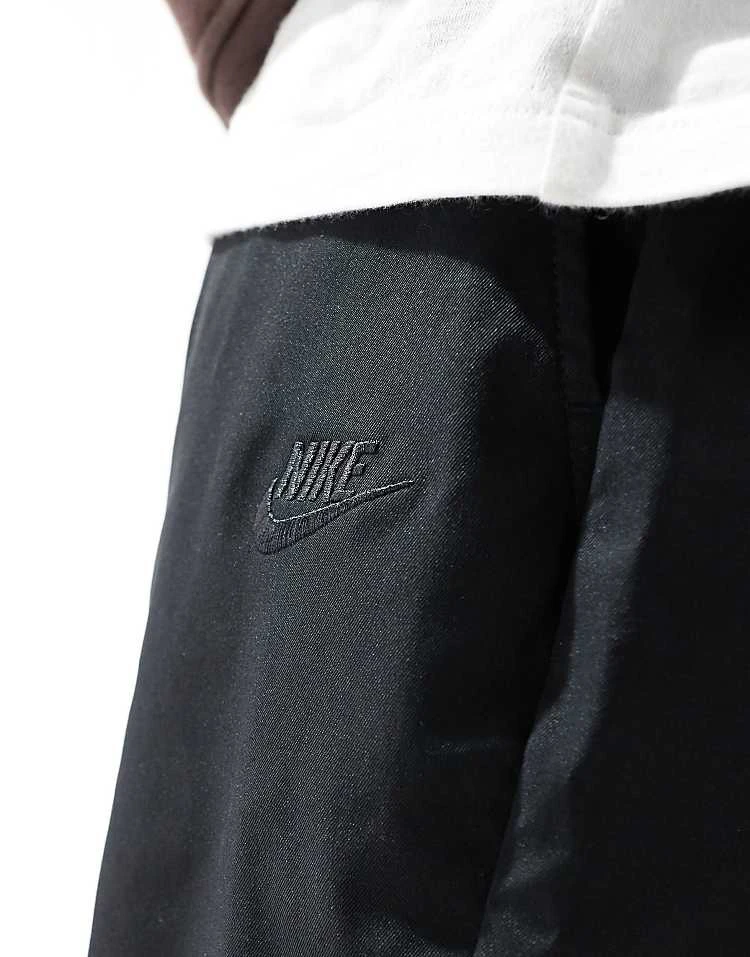 Nike Club Woven Tapered Trousers In Black For Men 4 Nike Club Woven Tapered Trousers In Black For Men - Image 2