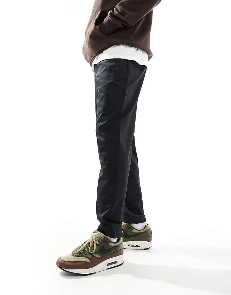 Nike Club Woven Tapered Trousers In Black For Men 5 Nike Club Woven Tapered Trousers In Black For Men - Image 3