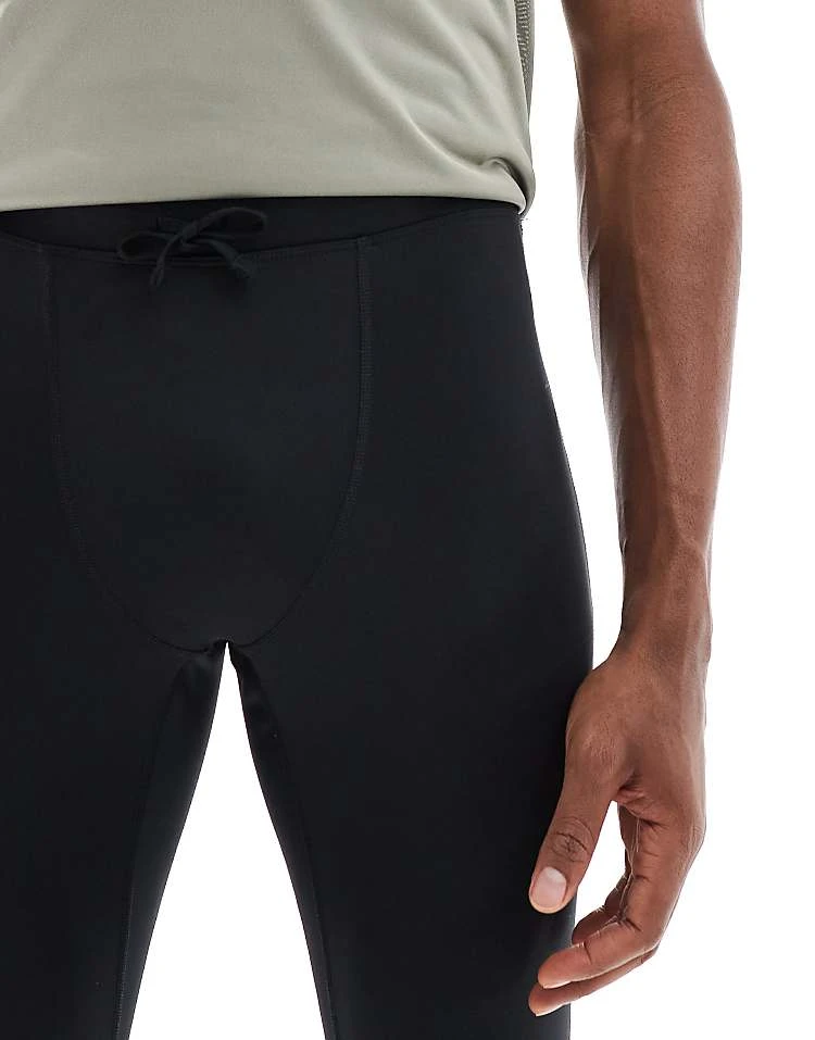 Nike Running Challenger Dri-FIT Tights In Black For Men 6 Nike Running Challenger Dri-FIT Tights In Black For Men - Image 4